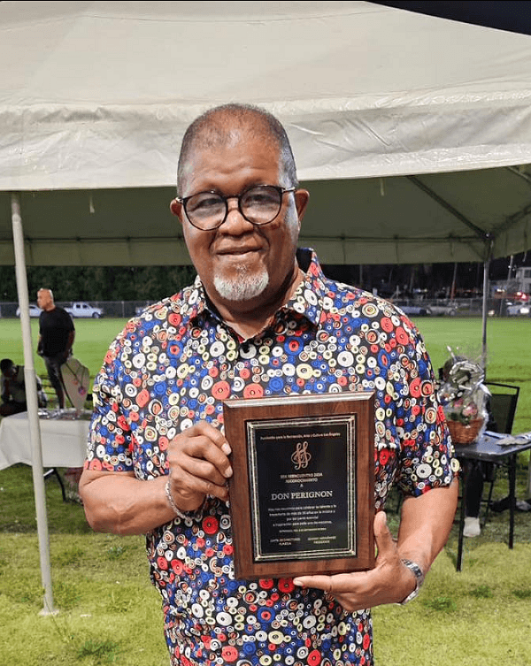 Don Perignon con un reconocimiento